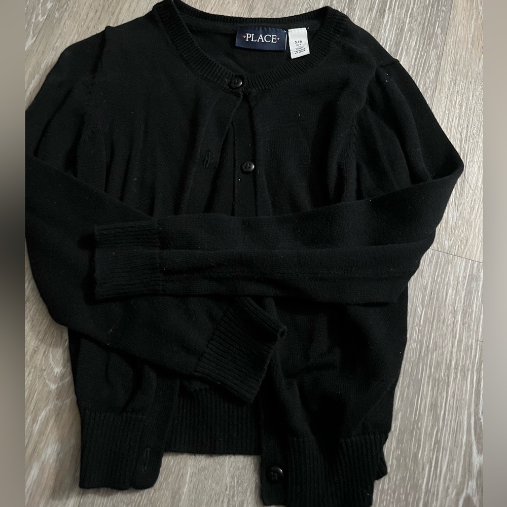 Black button up sweater